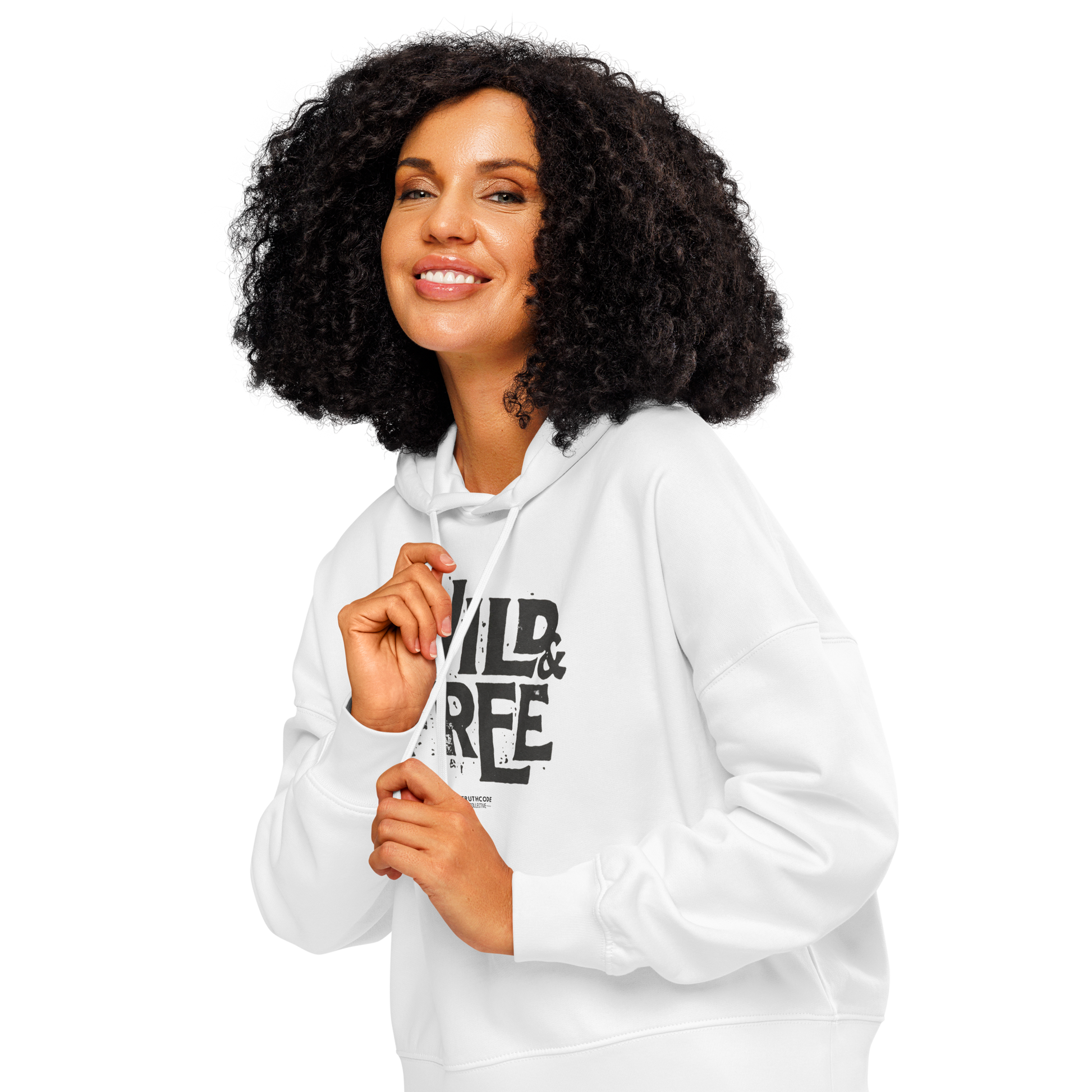 Woman wearing white organic hoodie with 'Wild & Free' text design, on a white background